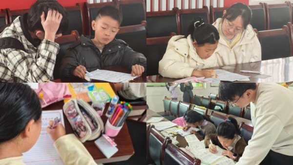 图为支教队员辅导孩子们_副本.png